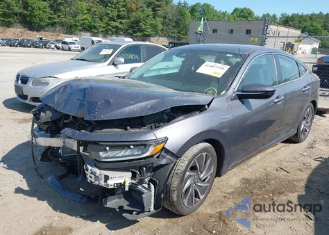 2022 Honda Insight Touring z USA, uszkodzony, nr VIN 19XZE4F94NE008199